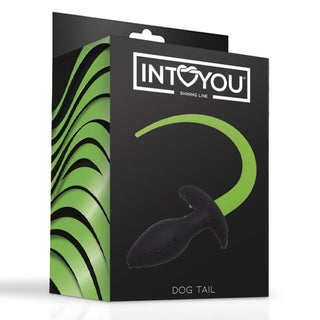 En svart och grön INTOYOU-låda med en självlysande produkt som heter Glow in the Dark Tail Buttplug, med en grön svansbild - perfekt för valplekar och hundsvans-plugg-fans.