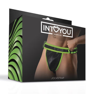 Produktbox med en manlig torso i Shining Line Glow Jockstrap-svart och grön, tillverkad av veganskt läder-märkt INTOYOU och JOCKSTRAP.