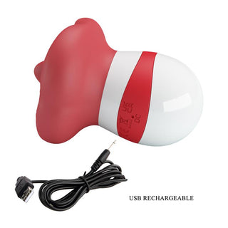 Handhållen slickstimulator i röd och vit silikon med böjd design och medföljande USB-laddningskabel.