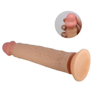 En hudfärgad silikondildo med en flexibel, realistisk spets och en sugkopp som fäste, visad i närbild.