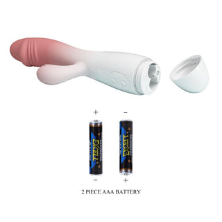 Kaninvibrator i vit och rosa silikon med ett öppet batterifack avsett för två AAA-batterier.