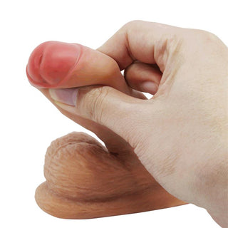 Pretty Love Warnell dildo tillverkad av texturerat TPR-material, visas i en neutral färg med detaljerad ytdesign.