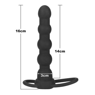 Lovetoy Dubbel Trouble Penisring, en svart silikonpärlplugg med en slingad bas, som mäter 16 cm lång och 3 cm bred, visas på en vit bakgrund.