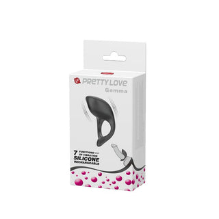 USB-penisring i svart silikon som visas på förpackningen med rosa bubblor som accent.