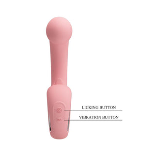 Rosa silikon dubbelvibrator med märkt rörlig tunga och vibrationskontrollknappar på handtaget.