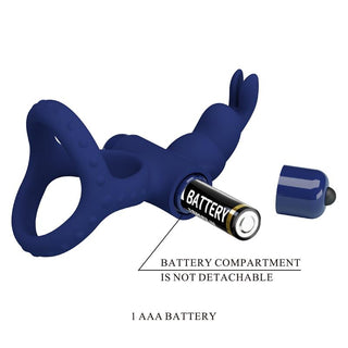Kaninformad Cockring med Vibration i mörkblått, dubbla ringar och en kaninformad vibrator. Batterifacket är öppet och visar ett AAA-batteri. Perfekt vibrerande penisring för par.