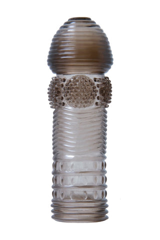 Selopa Penissleeve Set innehåller en glasskulptur med texturerade mönster, en rundad topp och cylindrisk kropp i bruna och vita nyanser, som utsöndrar intensiva vibrationer.