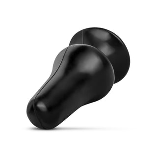 Bred Svart Buttplug 12 cm: ergonomiskt utformad, slät och glänsande yta av kroppssäker och ftalatfri PVC, visa mot vit bakgrund.