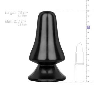 Bred Svart Buttplug 12 cm, tillverkad av kroppssäker och ftalatfri PVC med en utsvängd bas, visas bredvid en linjal och läppstift för att visa dess storlek.