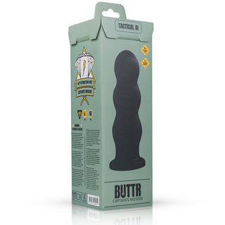 Den gröna produktlådan med en iögonfallande vågig siluett visar upp de spännande egenskaperna hos XXL Ribbad Buttplug från BUTTR, och framhäver dess intensiva stimulans genom innovativa element som en räfflad design.
