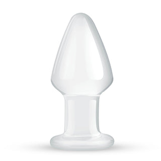 Gildo Glass Buttplug 4,6 cm, tillverkad av temperaturkänsligt borosilikatglas, står upprätt med en bred bas och avsmalnande spets på en vit bakgrund.