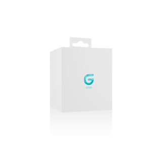 Vit ask med en blå G-logotyp och texten "Gildo", plus en upphängningsflik på toppen. Innehåller Gildo Glass Buttplug 4,6 cm, tillverkad av premiumborosilikatglas för en unik temperaturkänslig upplevelse.