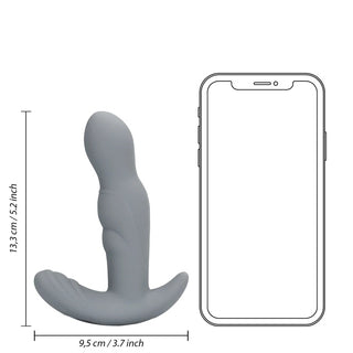 Den roterande prostatastimulatorn är en grå ergonomisk enhet gjord av kroppssäker silikon, med mått som visas bredvid en telefonkontur för storleksjämförelse.