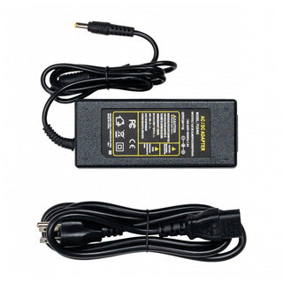 En svart AC/DC-adapter med nätsladd och anslutning perfekt för att driva enheter som Lovense Sexmaskin, vilket förbättrar din sexupplevelse på distans genom sömlös anslutning via Lovense-appen.