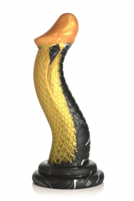 Golden Mamba Dildo är en guld- och svart ormformad skulptur med en lindad, strukturerad S-formad design på en rund bas.
