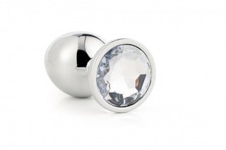 Gleaming Love Silver Plug Large, gjord av högkvalitativt aluminiummaterial, visar tydligt upp en stor klar ädelsten mot en orörd vit bakgrund.