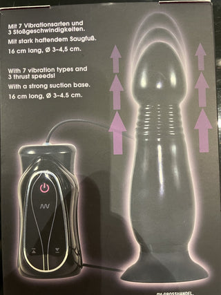 Förpackningen till "Analplugg som går upp och ner", en innovativ vibrerande enhet med fjärrkontroll, innehåller specifikationer på tyska och engelska. Dess diskreta design har en sugpropp för säker placering, som sömlöst integrerar olika preferenser.