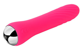 Svakom Anya Värmande Vibrator är en rosa, texturerad cylindrisk massageapparat med silverände, med silikon räfflor för förbättrad känsla.