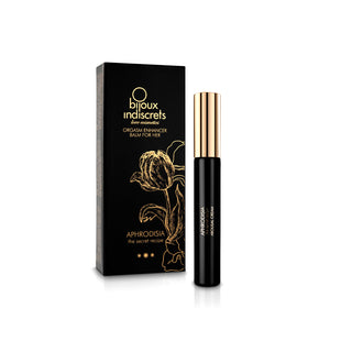 Den svarta och guldiga förpackningen av Aphrodisia Orgasm - Klitoris Olja 13 ml för henne visar upp en elegant blommig design.