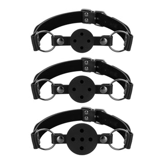 Upplev det ultimata inom BDSM-lekar med Gagball Set 3-Pack, med tre svarta läder- och gummikulor i en vertikal linje, var och en utrustad med ventilationshål och justerbara remmar.