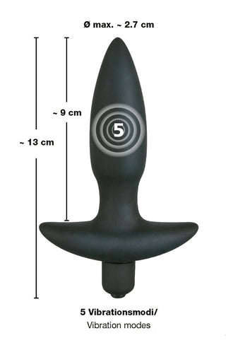 En snygg Black Velvets Ankarplugg tillverkad av högkvalitativt silikon, denna svarta vibrationsplugg mäter 13 cm i total längd med 9 cm insättningsbar och en maximal diameter på 2,7 cm. Den har fem vibrationslägen, var och en illustrerad av koncentriska cirklar och siffran 5.