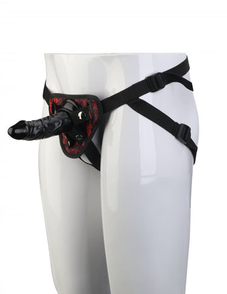 Blaze deluxe Strap on med med dildo har en elegant design med justerbara remmar och en dekorativ frontpanel för komfort och stil.
