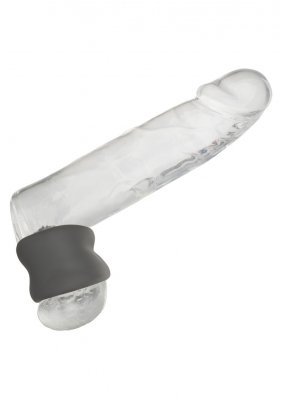 Alpha Scrotum Ring är en transparent, realistisk silikonprodukt med en svart sugbas, gjord av flytande silikon och isolerad på en vit bakgrund.