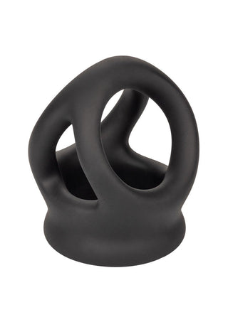 Alpha Dual Cage Penisring, en svart abstrakt skulptur med en slät matt finish, är tillverkad av Alpha Liquid Silicone och bildar en spännande slinga.