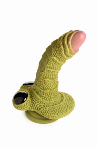 Denna nyckfulla leksak härmar Swamp Monster Dildo med sin gröna, strukturerade kropp och rosa spets. Tillverkad av högkvalitativt silikon, innehåller den en sugbas för stabilitet och slående svarta ögondetaljer för en spännande look.