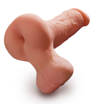 Produkten Realistisk Material, Dildo Med Hål, är en köttfärgad, texturerad TPE-vara som liknar en kycklingklubba på vit bakgrund.