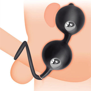 Svart silikon Lovetoys Uppblåsbar Anal Plug med en återvinningssladd, visas uppblåst för att visa sin expanderbara design.