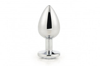 The Gleaming Love Silver Plug Large visar upp en avsmalnande design och rund bas, gjord av högkvalitativt aluminiummaterial för ultimat anal njutning, allt mot en orörd vit bakgrund.