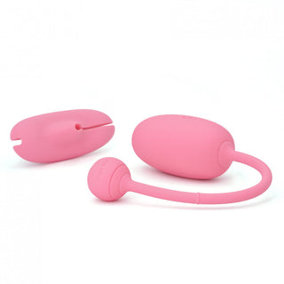 Magic Motion Kegeltränare Rosa har två rosa silikon-kegel-tränare på vit bakgrund, en sfärformad med en svans, perfekt för Kegelövningar.