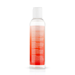 Easyglide 2 in 1 - Massage & Glidmedel 150 ml är en genomskinlig plastflaska med vitt lock och livfull röd etikett med djärv vit text, designad för älskare av silikonsmörjmedel som vill ha en elegant design och ergonomiskt grepp.