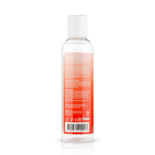 Easyglide 2 in 1 - Massage & Glidmedel 150 ml har en tydlig design med vitt lock och röd-orange etikett. Idealisk för dem som föredrar enkelhet, den passar både massageoljepass och behov av silikonsmörjmedel. Streckkoder och symboler är diskret placerade längst ner.