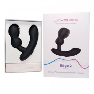 Förpackningen och kartongen till Lovense Edge 2 - Prostata Vibrator, en fjärrstyrd prostatamassager, visas. Den synkroniseras sömlöst med Lovense-appen för en förbättrad, personlig upplevelse.