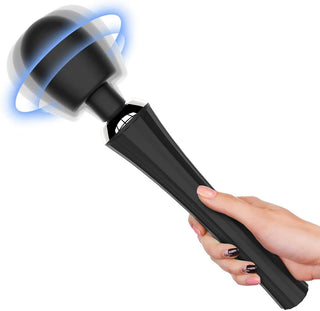 Lovetoys Magic Wand Vibrator: svart, stavformad med ett rundat huvud, avger blått sken; slät yta.