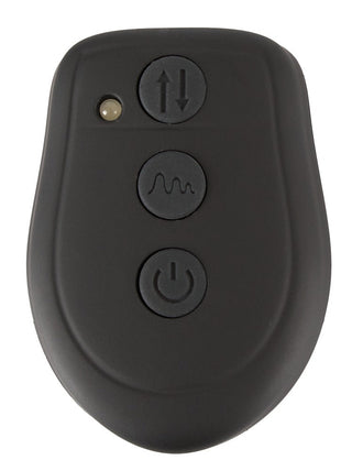 Fucking Machine Med Fjärrkontroll i svart innehåller tre knappar med pil-, våg- och effektsymboler.