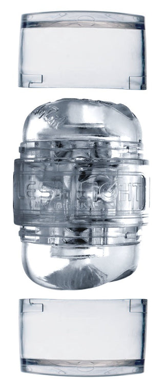 Vi presenterar Fleshlight Quickshot - Riley Reid: en genomskinlig cylindrisk behållare med två avtagbara lock som avslöjar en strukturerad insida för en unik upplevelse.