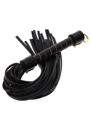 Utforska nya nöjesriken med TabooM Studded Flogger, en chic svart läderpiska med tofsar och en guldring på handtaget, perfekt för att förbättra dina BDSM-upplevelser.