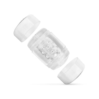FPPR Dubbel Masturbator har en transparent kapseldesign med en strukturerad insida, uppdelad i tre sektioner på en orörd vit bakgrund.
