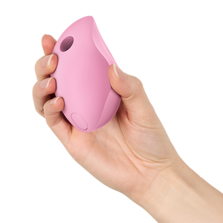 Rosa, ovalformad klitorisstimulator i silikon med Air Pulse-teknik och en synlig knapp på enheten.