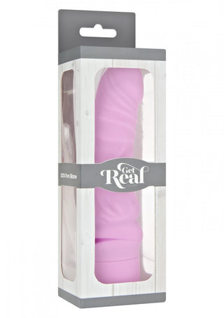 Bilden föreställer förpackningen av en rosa "Get Real Mini Dildovibrator" gjord av 100% ren silikon. Boxen har ett genomskinligt plastfönster som visar produkten och har ett vitt och grått färgschema.
