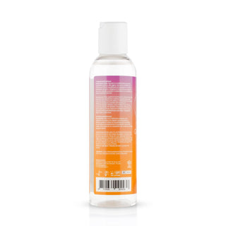 Baksidan av den klara Easyglide Glycerine Free-flaskan, med vitt lock och orange-lila etiketter, framhäver dess vattenbaserat glidmedel för långvarig glidförmåga och en förbättrad upplevelse.