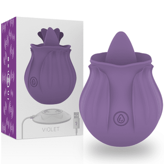 Intense Violet Klitoris Tungvibrator, en lila rosformad enhet, kommer med en vackert märkt låda och en laddningskabel på sidan.