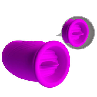 Daisy Dual Egg Vibrator i lila silikon har en räfflad inre kammare och en rund öppning, som visas från två olika vinklar.