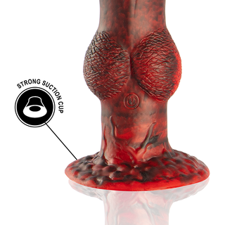 Vibrerande dildo i röd och svart silikon med symbol för strömknapp och stark sugkoppsbas.