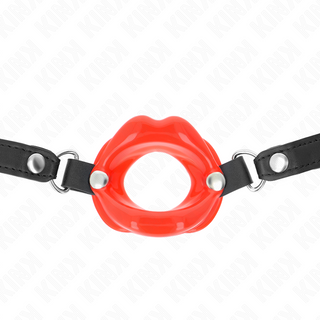 Svart mun-gag med justerbara remmar i syntetmaterial och metallringar, designad för bondage och rollspel.
