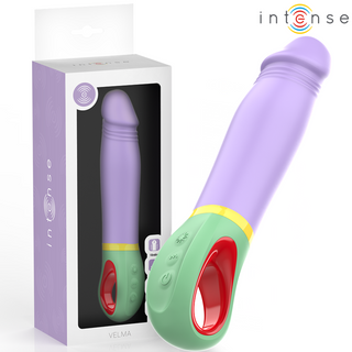Intense Velma Classic Vibrator Lila, som har ett handtag, visas bredvid sin förpackning. Dess silikonyta och vattentäta design garanterar komfort och mångsidig användning.