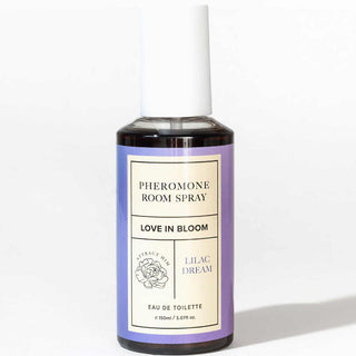 Eye of Love Feromonspray-flaska, 150 ml, klar med vit kapsyl, enkel cylindrisk design på ljus bakgrund.